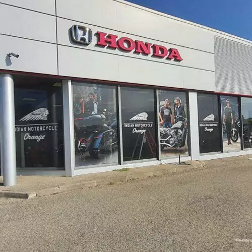flocage microperforé vitrine magasin de motos bleu