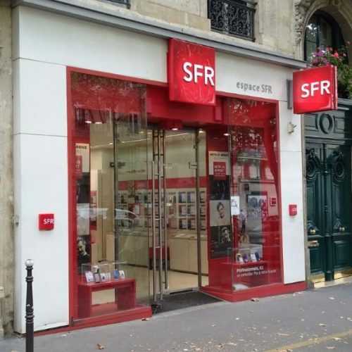 Covering vitrine habillage adhésif boutique SFR