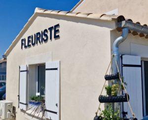 Enseigne lettres découpées noires lettres dibond